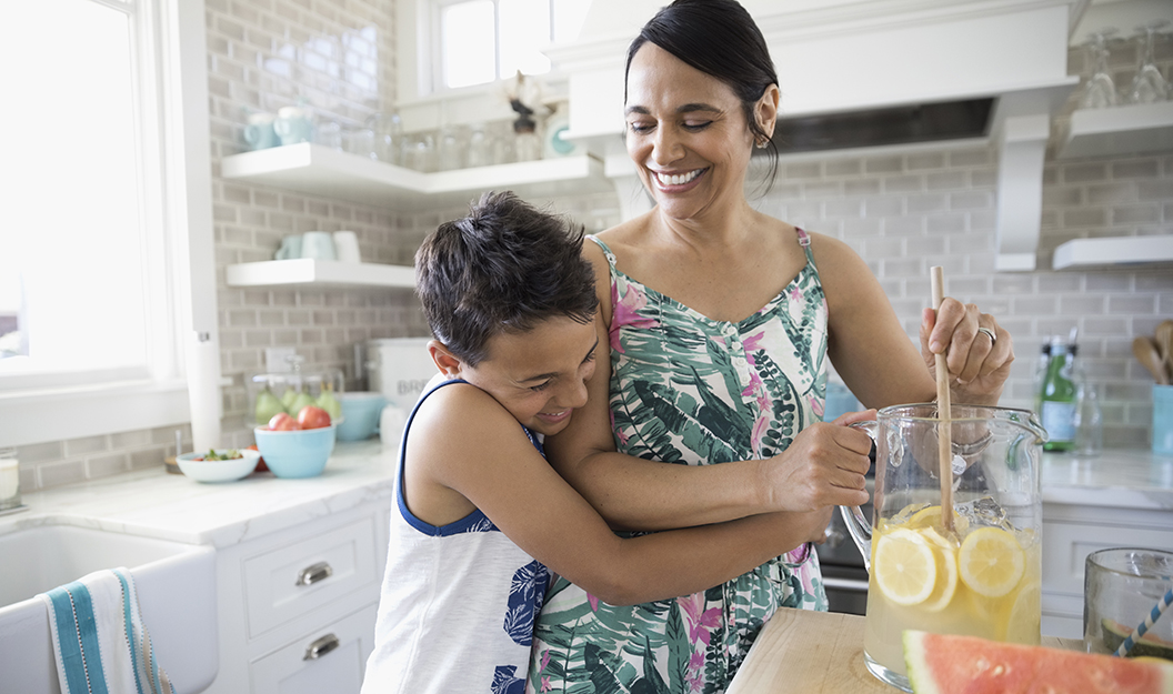 son hugs mom