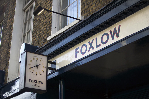 The clock outside Foxlow restaurant in London