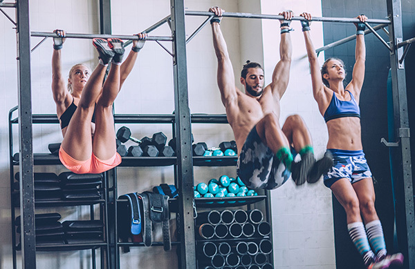 People on pull-up bars