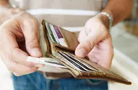 Man opening wallet