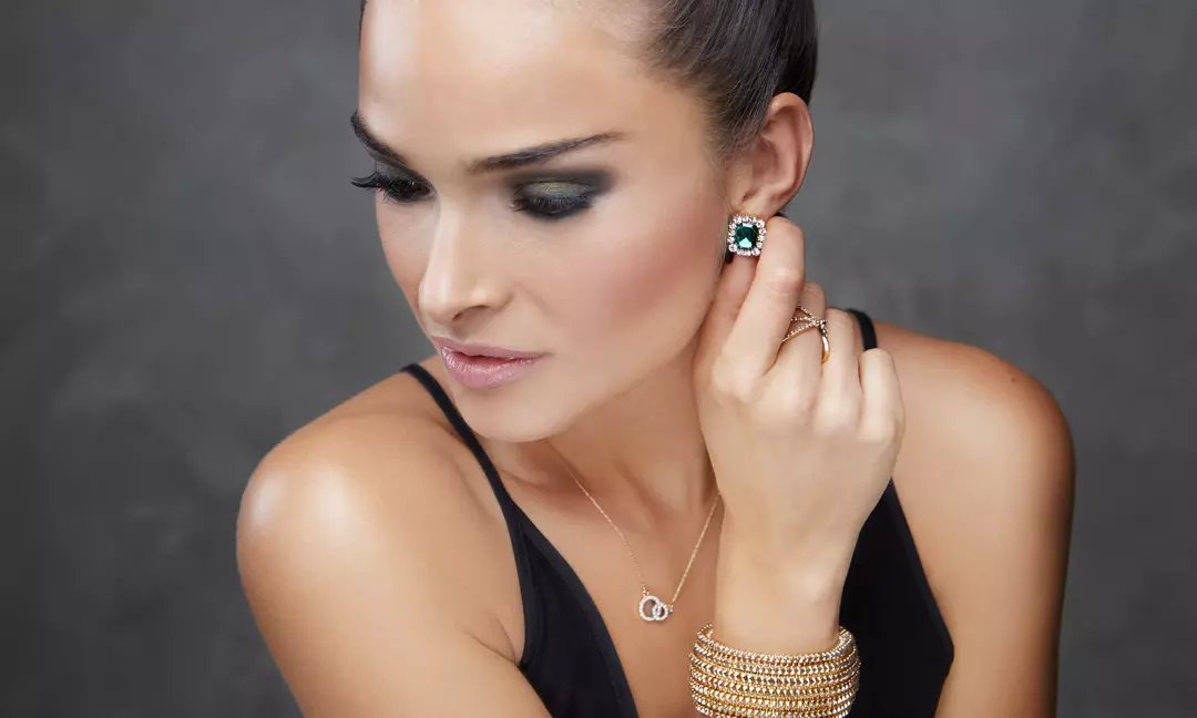 woman wearing glam party jewelry