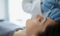 Woman getting Xeomin injections