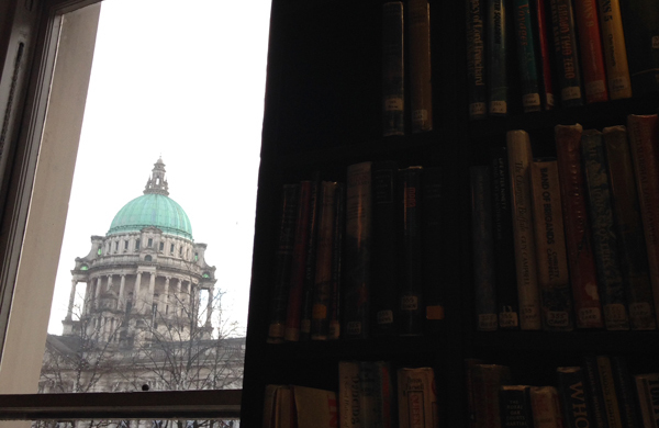 Looking at Belfast City Hall from the window of the Linen Hall Library