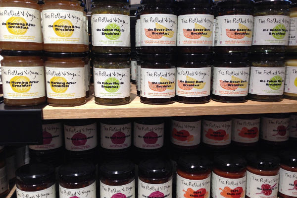 A shelf of various pickles and spreads in West Elm in London