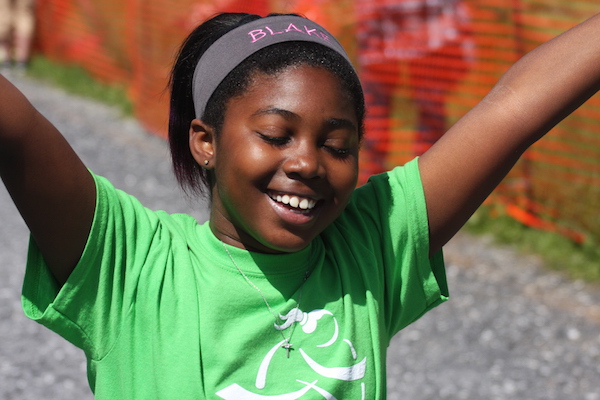 Girls On The Run (girl with outstretched arms)