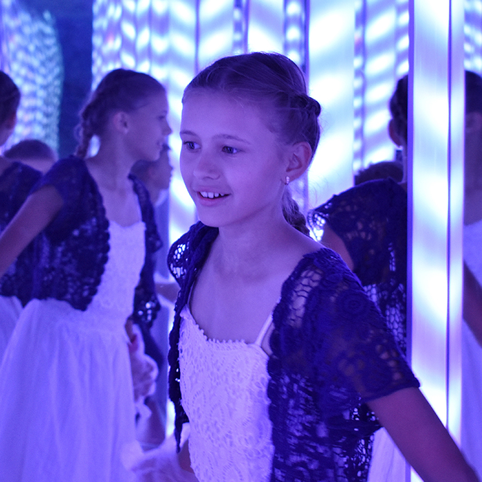 Kid at the Museum of Illusions