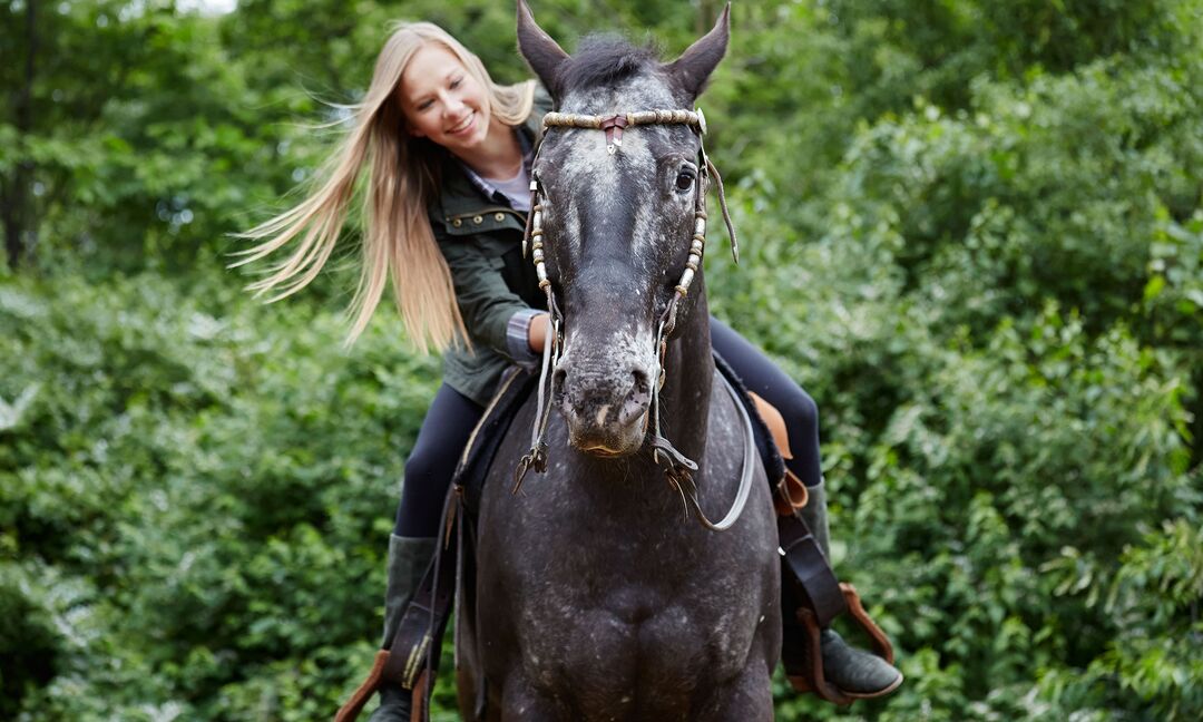woman horseback riding