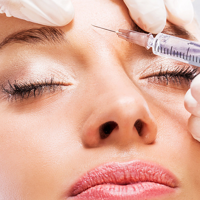 woman getting injected with a Botox alternative between her brows