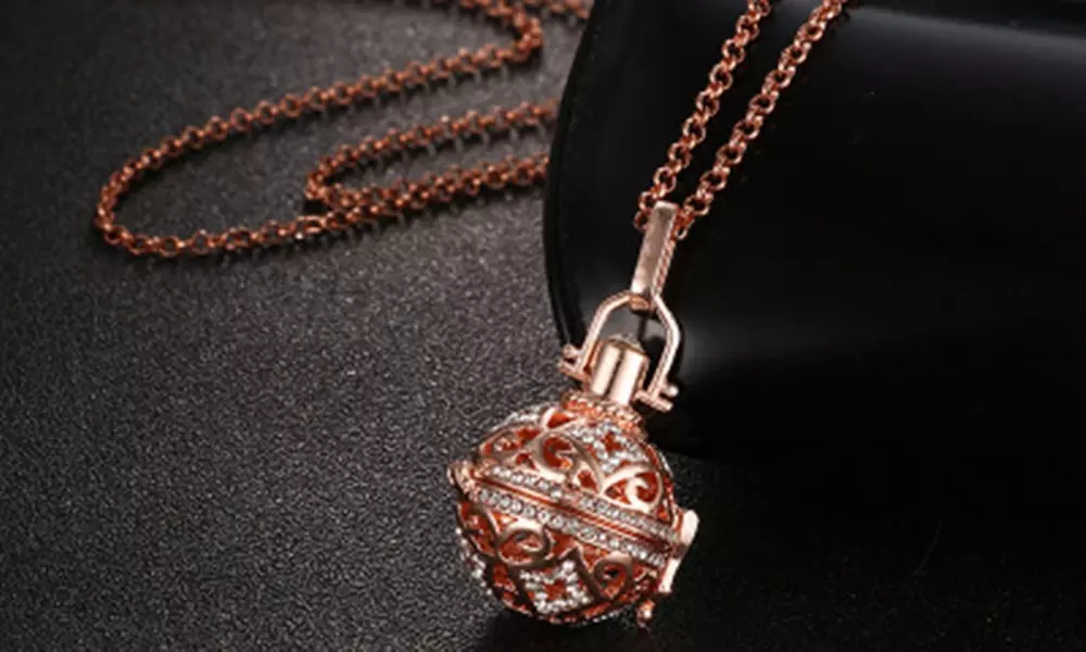 Leo Rosi Ball Lava Stone Glow Diffuser Necklace Locket Necklace for Perfume  - Primary Image