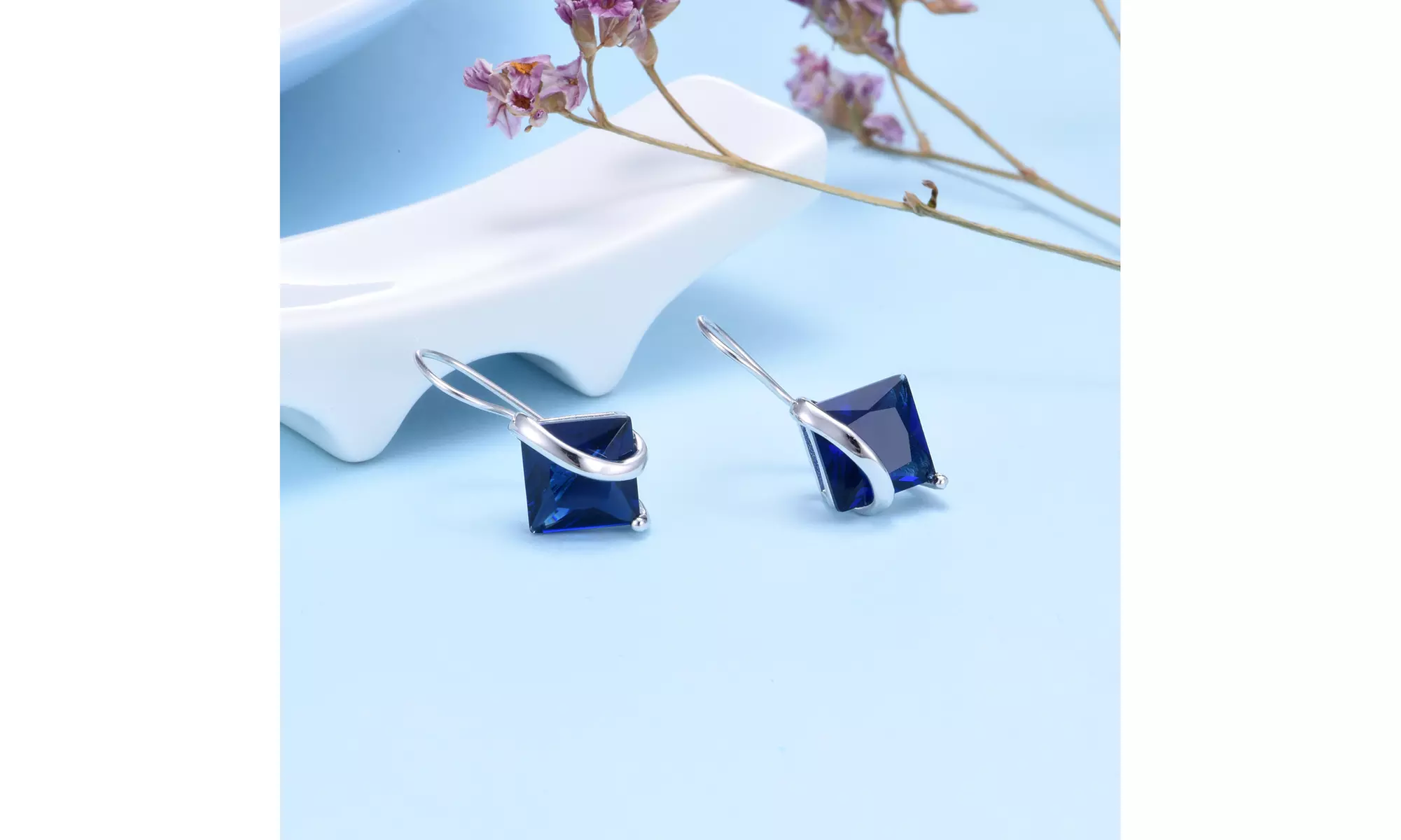 Sterling Silver Sapphire Diamond Cut Earring