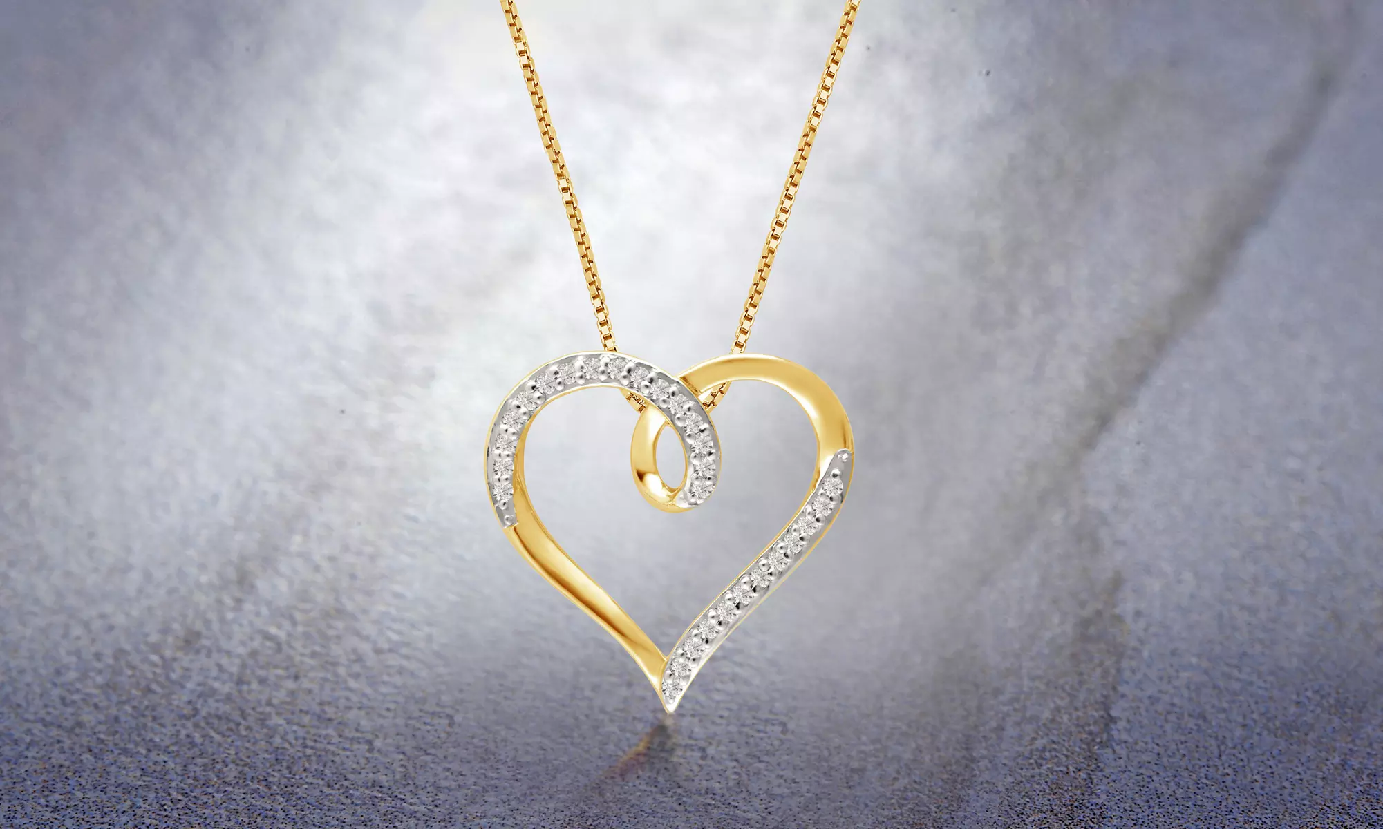 1/10 CTTW Diamond Heart Loop Pendant in 10K Gold by DiamondMuse - Primary Image