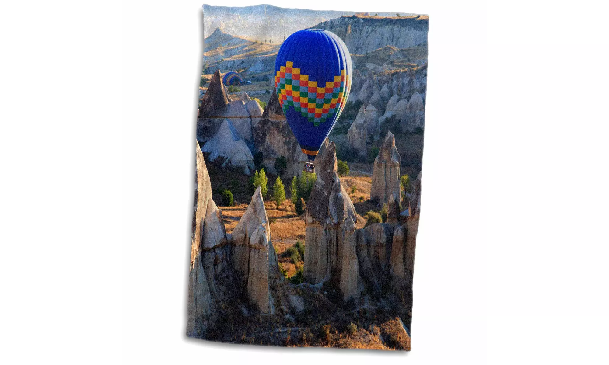  Towel - Turkey, Cappadocia, Hot air balloon flying above rock formations - Primary Image