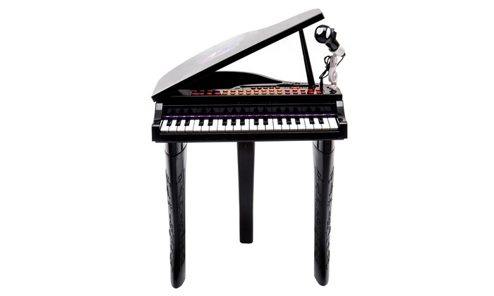 toy grand piano with microphone