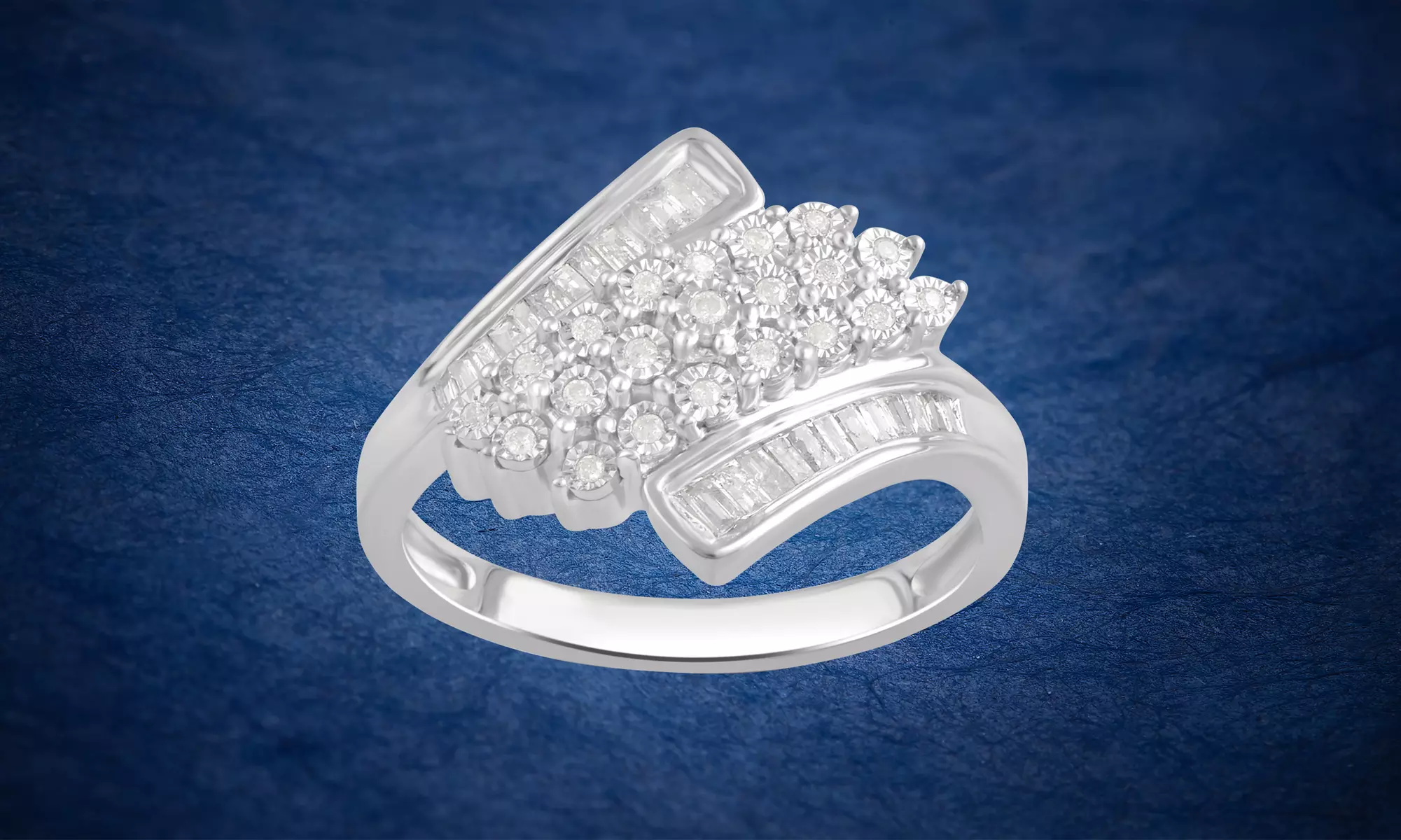 3/8 CTTW Round and Baguette Diamond Twist Ring in Sterling Silver by DiamondMuse - Primary Image