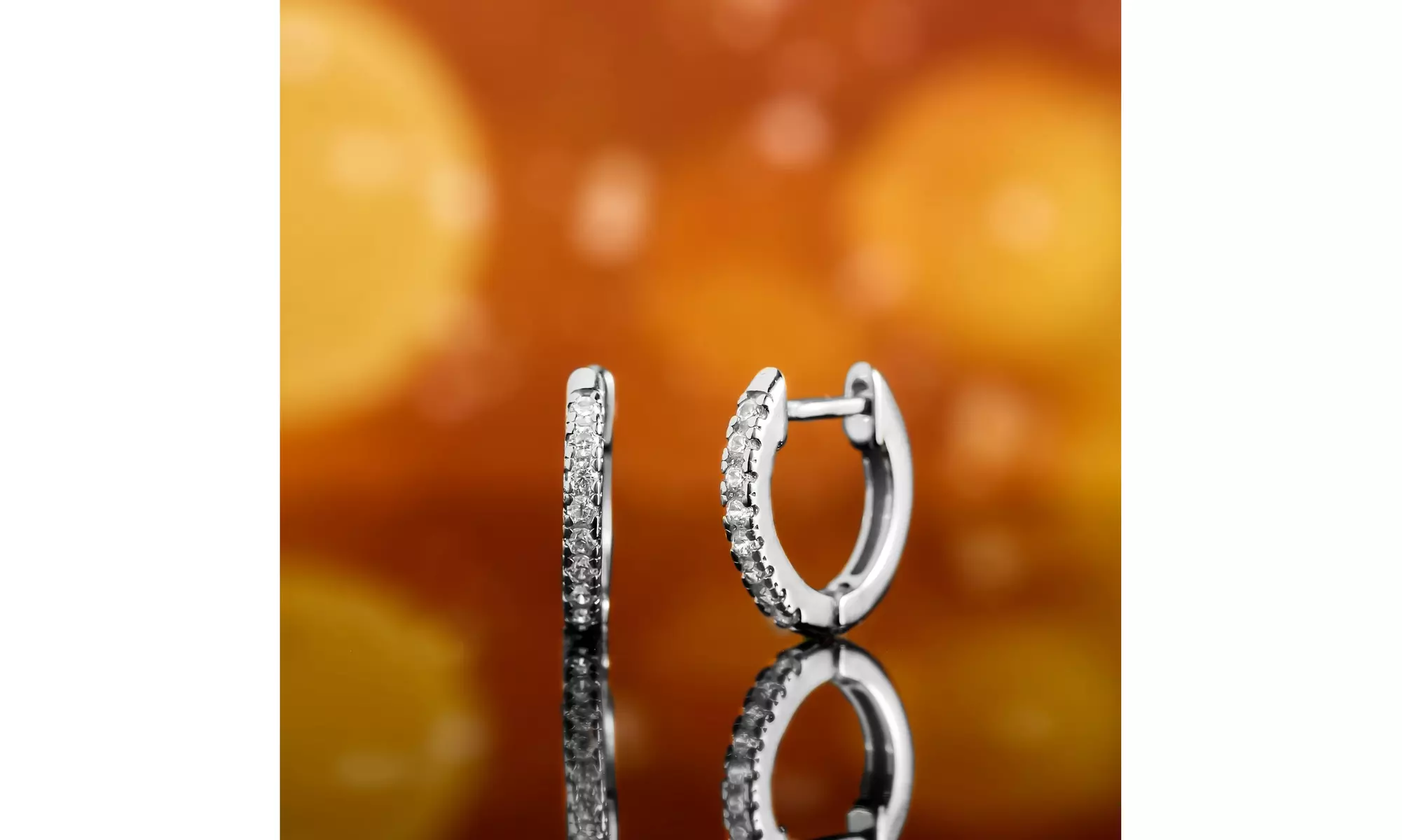 18K White Gold Plated Slim Huggie Earrings - Primary Image