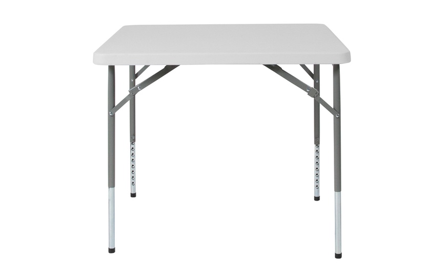 white square folding table and chairs