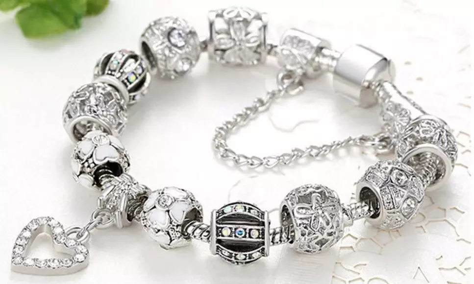 High quality Swarovski bracelet with 2 Limited Edition Charms