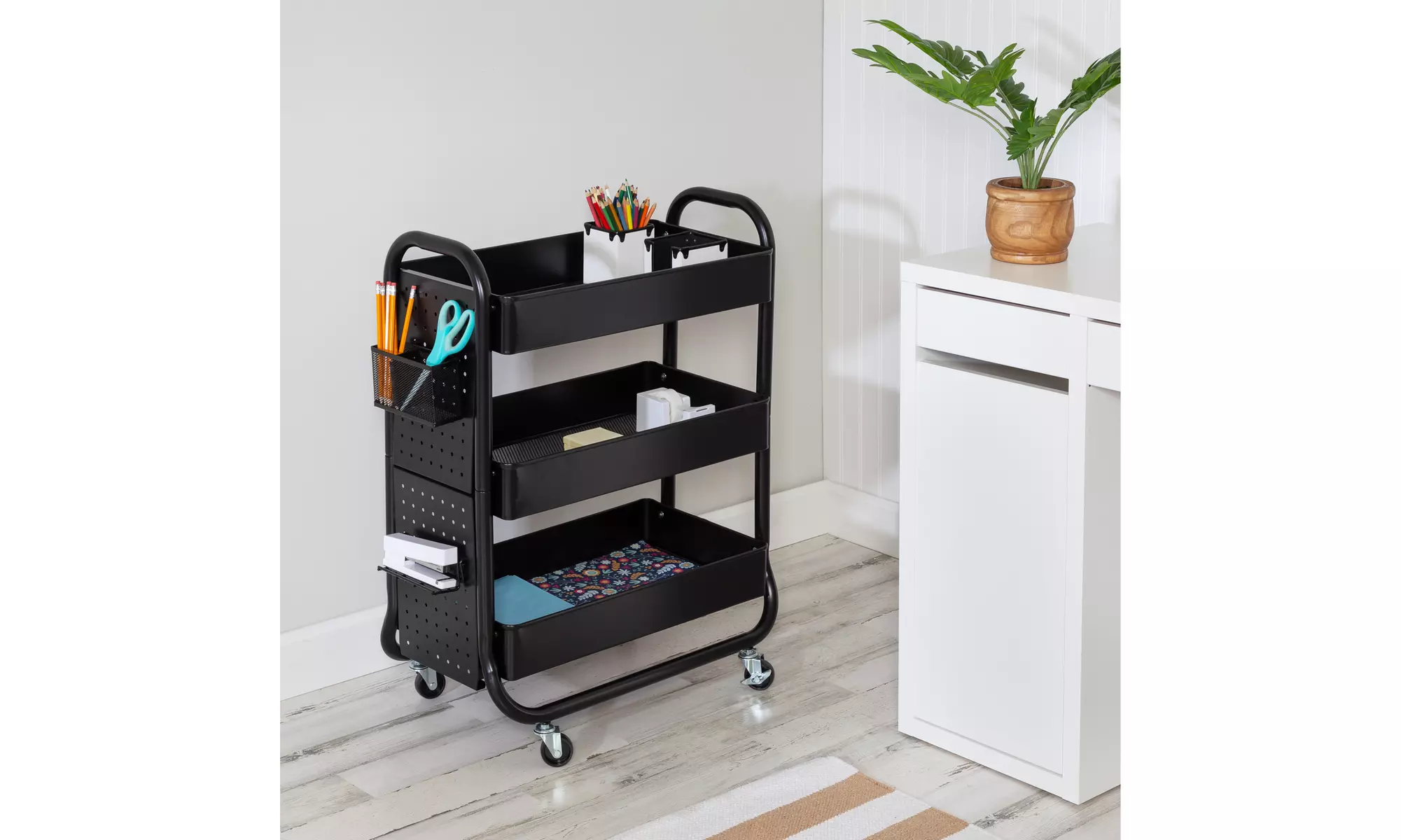 Black Rolling Craft Cart with Wheels, Pegboard, Shelf, and Metal Basket - Primary Image