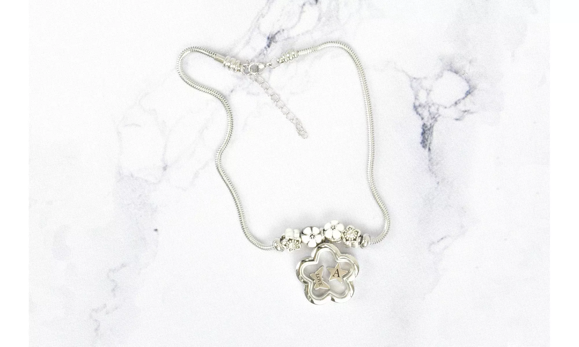 Kid's White Tone Initial Charmed Flower Locket Necklace By Pink Box - Primary Image