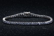7.00 CTTW Tanzanite Round Cut Tennis Bracelet in 18k White Gold - Second Medium