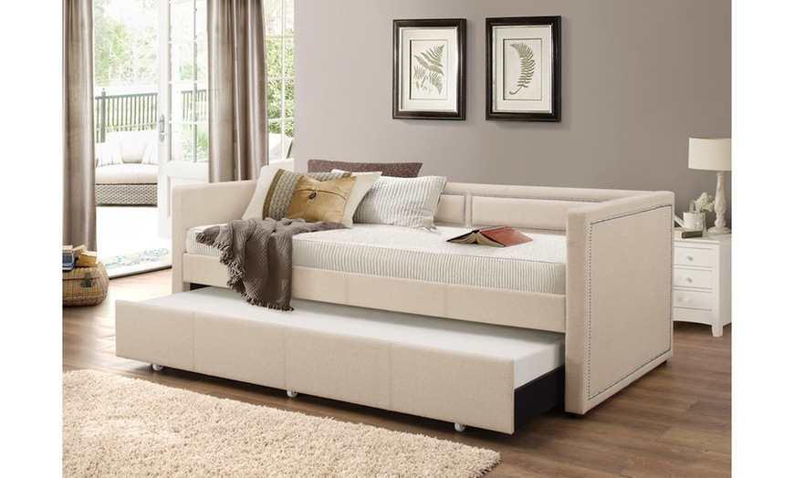 Up To 28% Off on Raymond Fabric Daybed with ro... | Groupon Goods