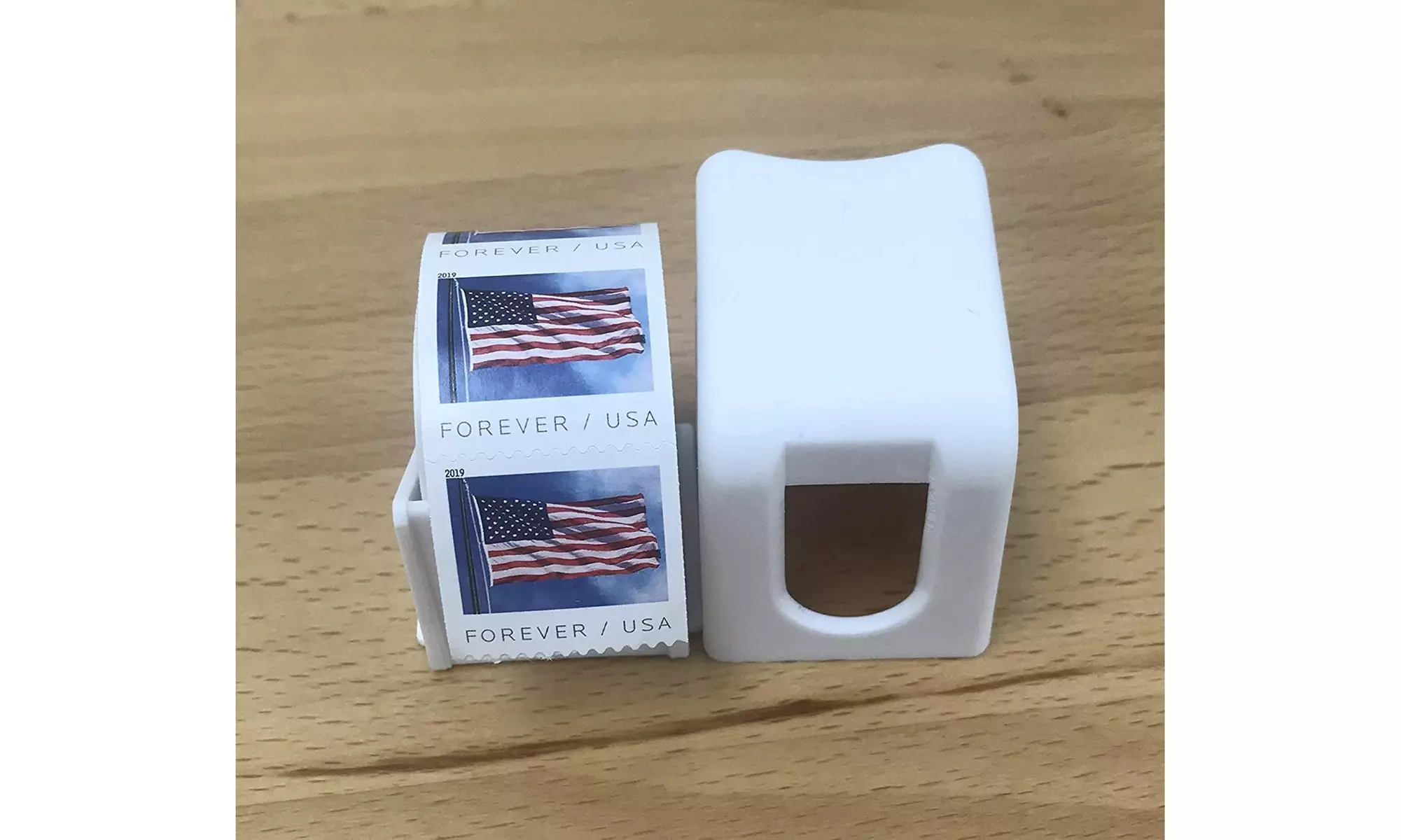 Stamp Roll Dispenser with a Roll of 100 Stamps - Second Medium