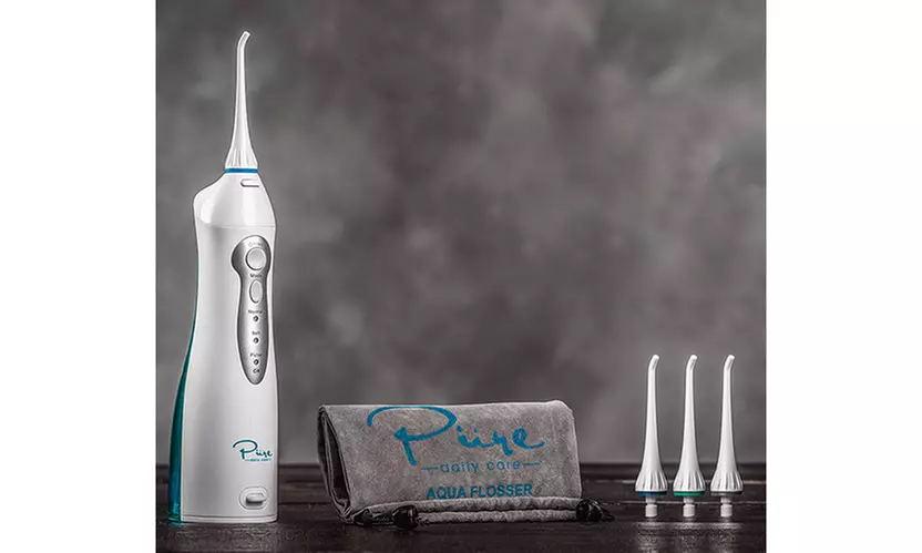 Pure Daily Care Water Flosser with 4 tips and Travel Bag - Second Medium