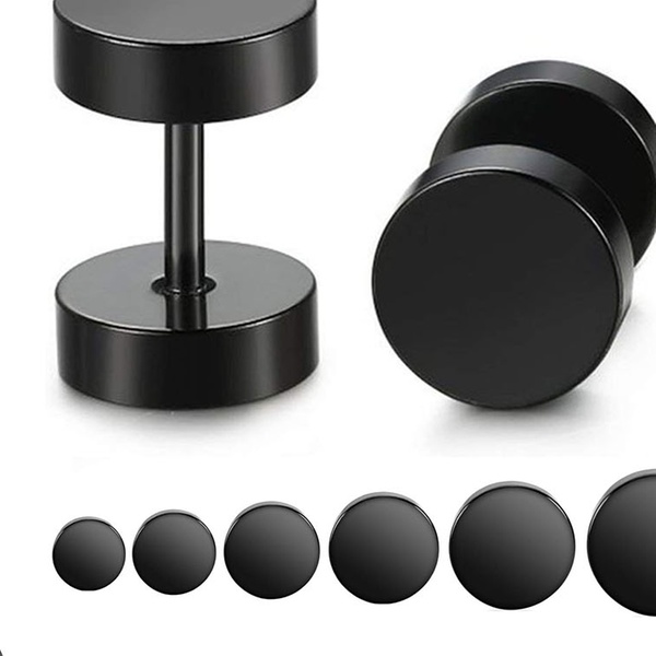 black earrings that look like gauges