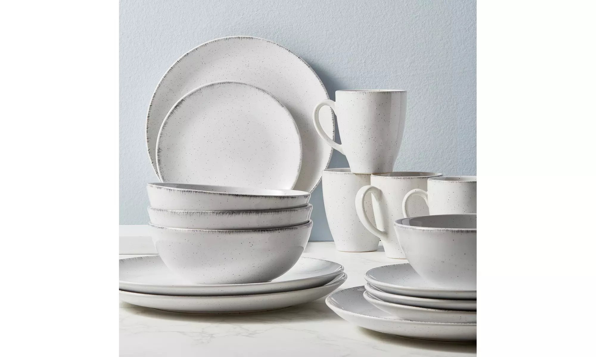 Urban Loft Liam 16-Piece Dinnerware Set in White/Grey Speckle - Second Medium