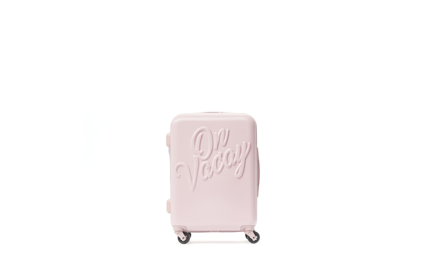 on vacay suitcase pink